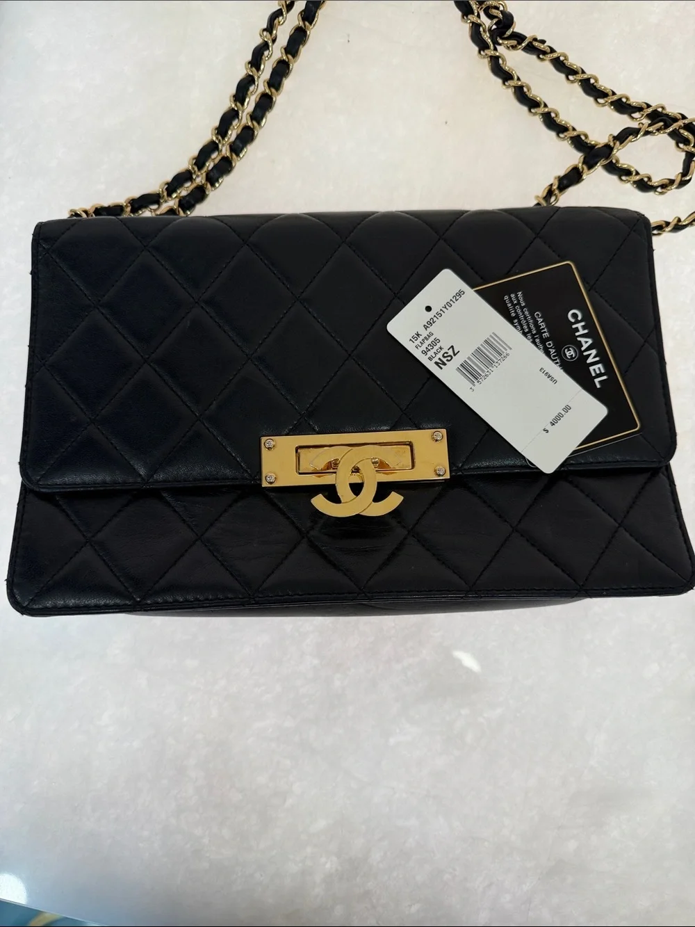 CHANEL Black Quilted Leather Shoulder Bag with Gold Hardware
